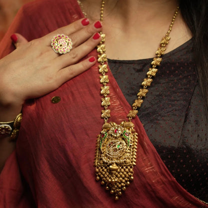P925 Silver Shop Handcrafted gold temple necklace with floral link chain and intricate pendant.