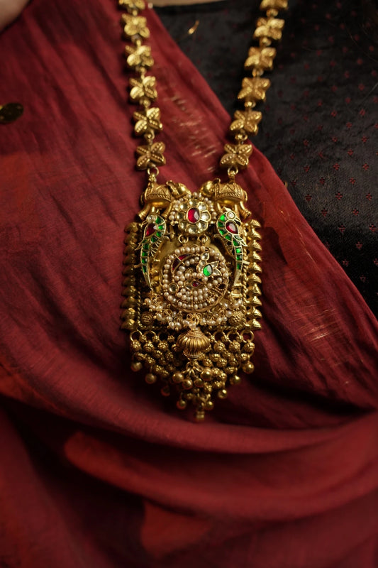 P925 Silver Shop Handcrafted gold temple necklace with floral link chain and intricate pendant.