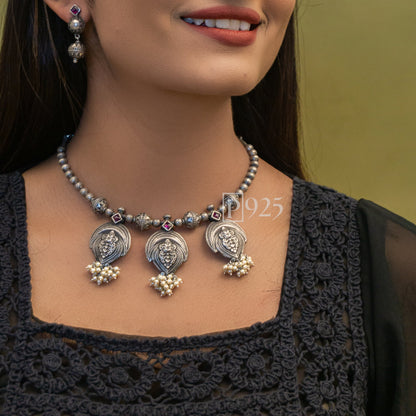 P925 A Blend Of South Indian Designs With Pearls And Earrings