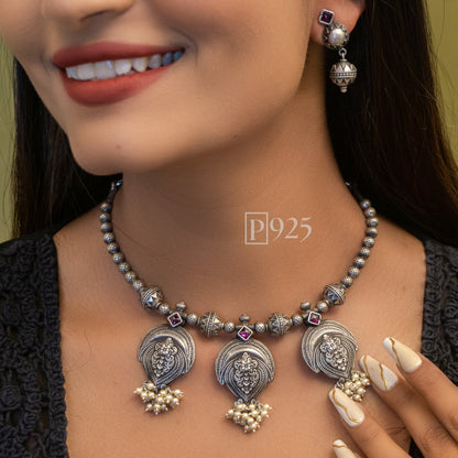 P925 A Blend Of South Indian Designs With Pearls And Earrings