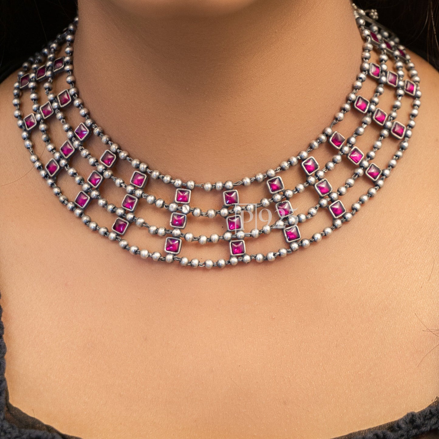 P925 Multilayered Silver Ball Neck Piece And Earrings With Ruby Stones Adding Fusion.